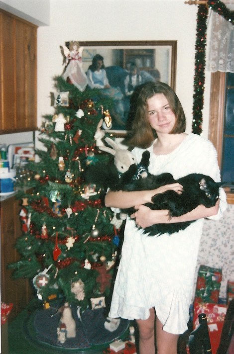Medium tree for our small Cape style home, with low ceilings!  12 year old daughter with her favorite cat, Othello.