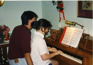 Playing the piano. I'm about 12.