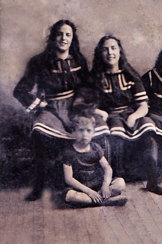 My great grandmother and her sister tease their brother.  Happy is bathing suits of the era.